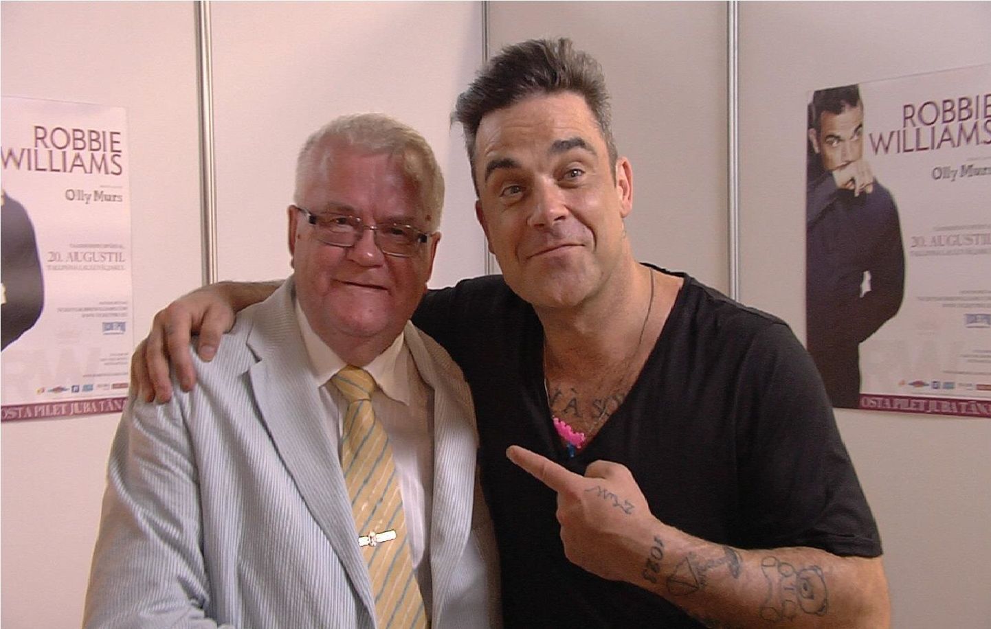 Edgar Savisaar ja Robbie Williams.