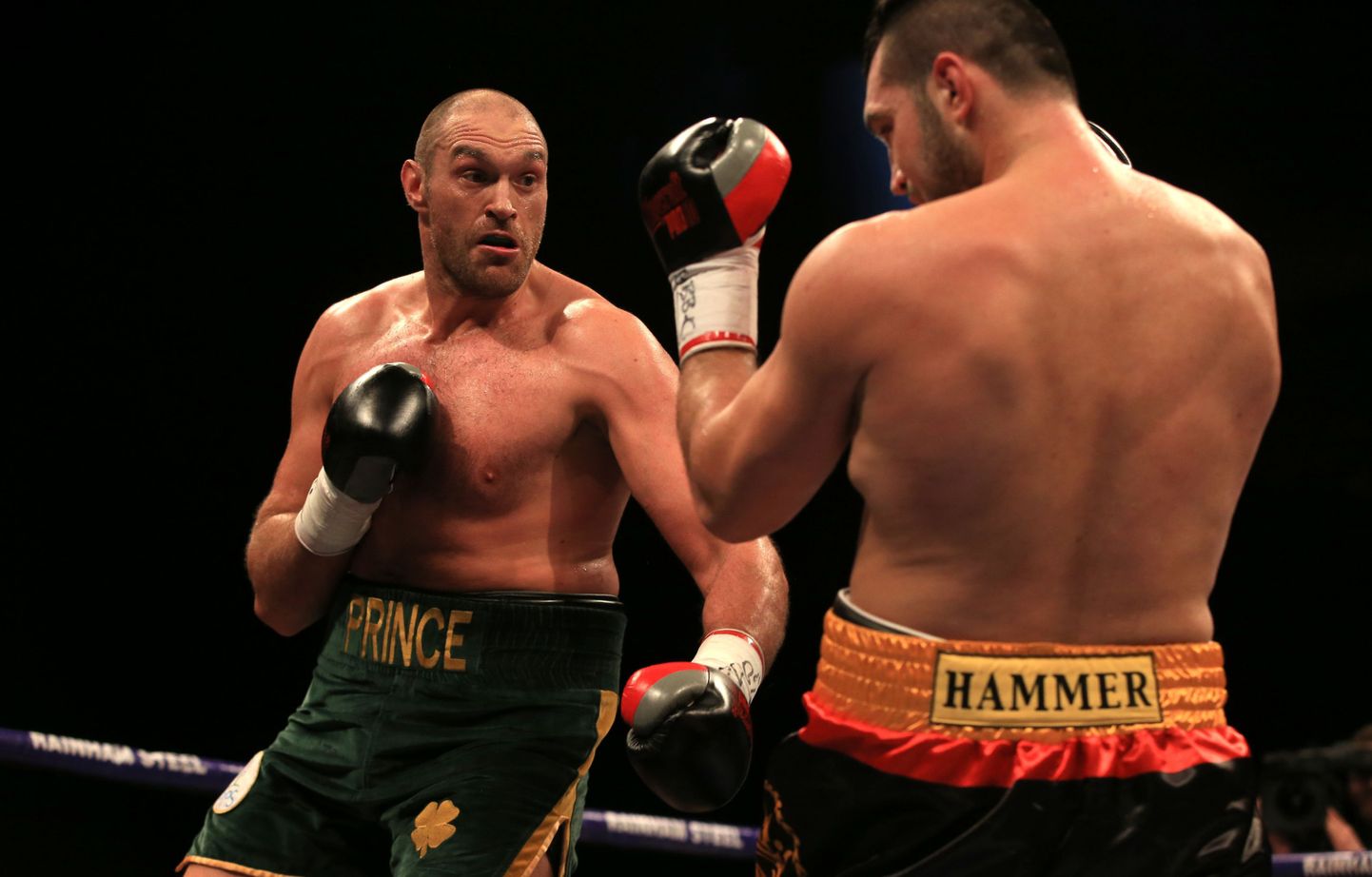 Tyson Fury (left) in action against Christian Hammer in their WBO International Heavyweight Championship bout at the O2 Arena, London.