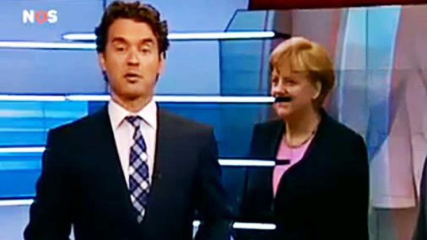Меркель предстала перед телезрителями с усами Гитлера.