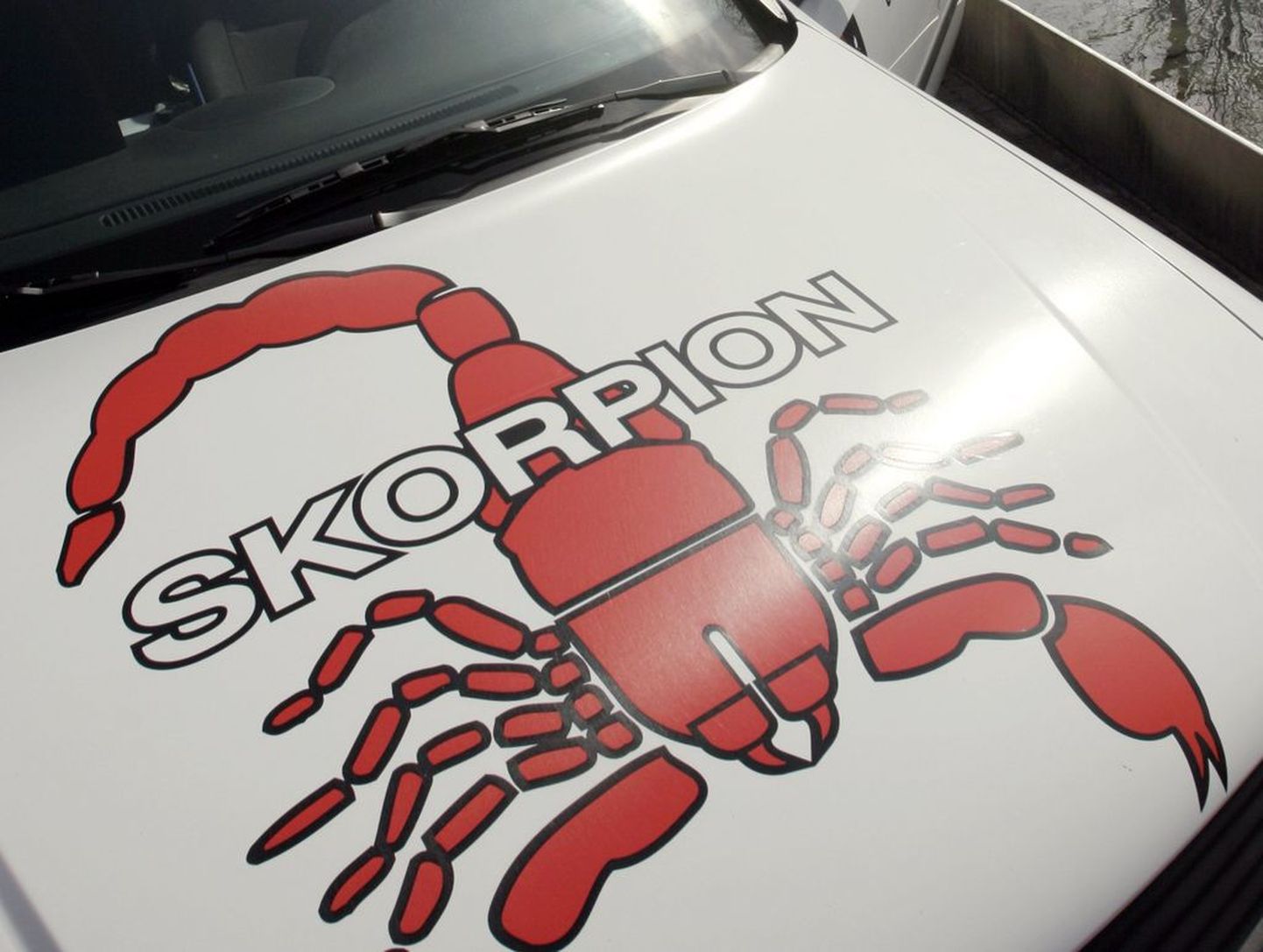 Turvafirma Skorpion Julgestusteenistus logo.