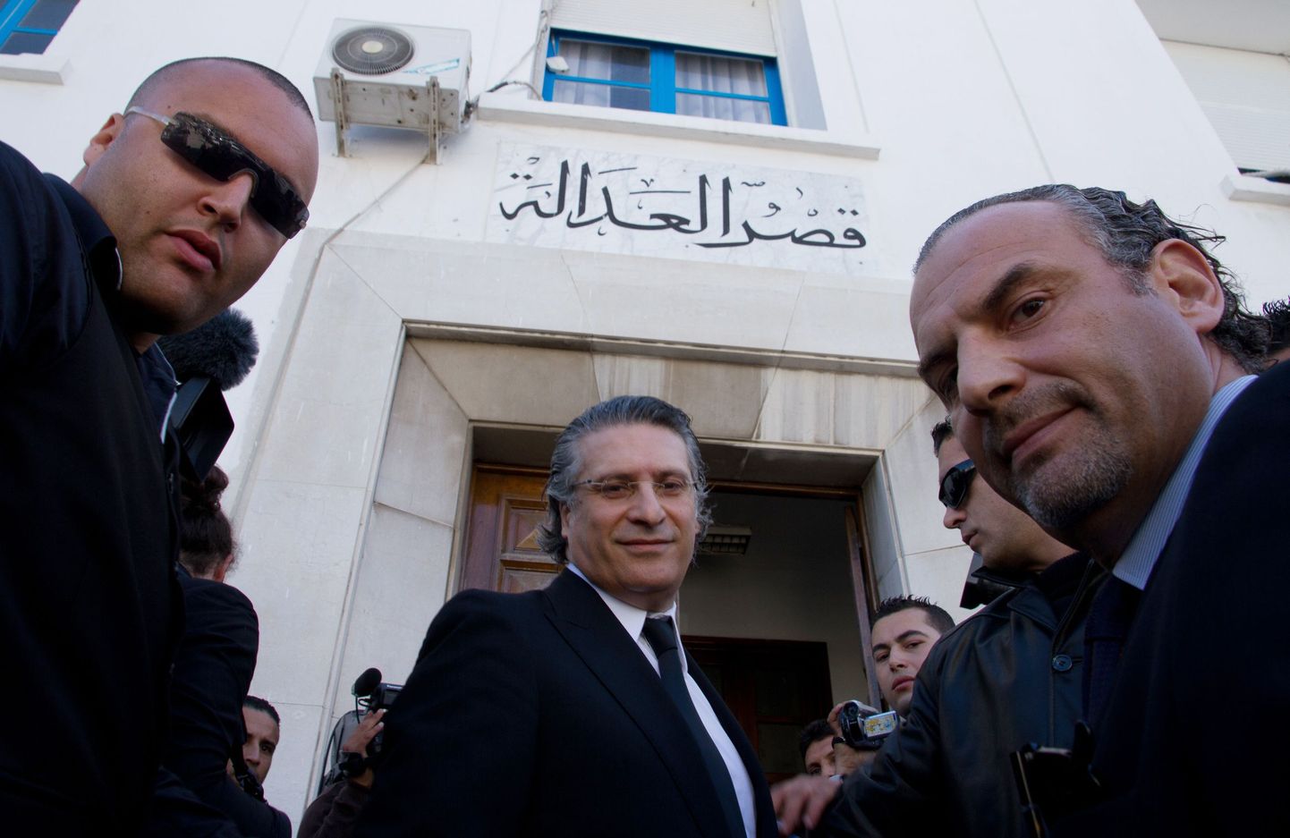 Tuneesia telekanali Nessma juht ja omanik Nabil Karoui (keskel).