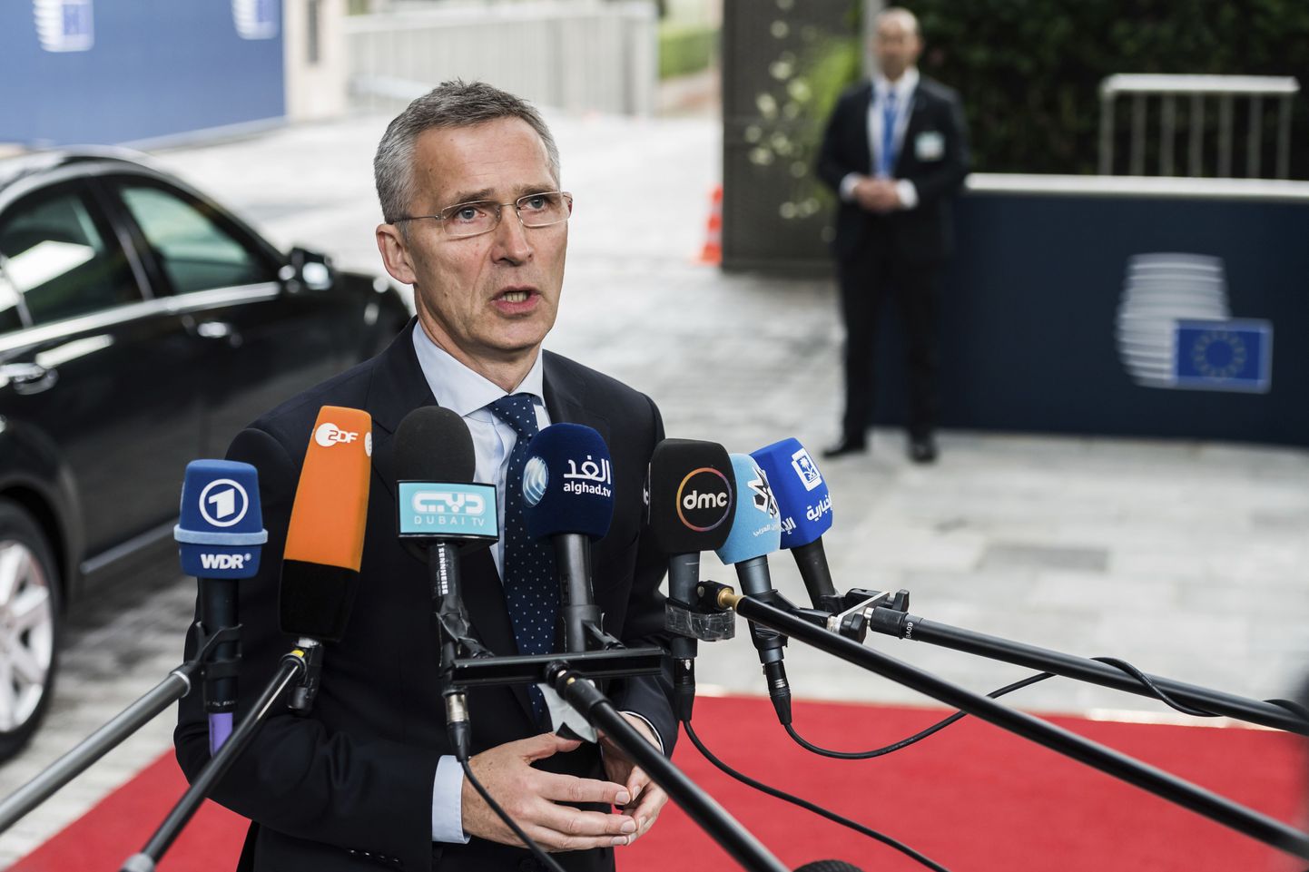 NATO Secretary General Jens Stoltenberg talks with journalists as he arrives for a meeting of EU foreign and defense ministers at the Europa building in Brussels, Thursday May 18, 2017. (AP Photo/Geert Vanden Wijngaert)