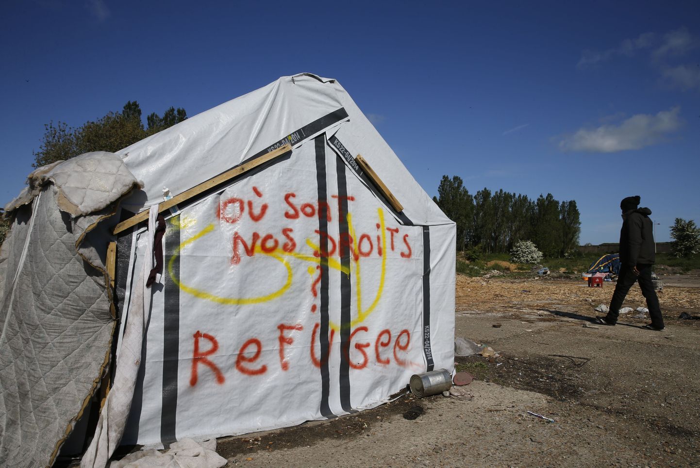 Põgenike telk Calais linna lähistel kannab kirja: kus on meie õigused?