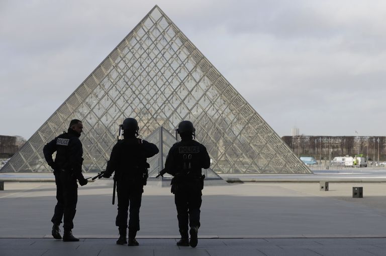 French police secure the site near the Louvre Pyramid in Paris, France, February 3, 2017 after a French soldier shot and wounded a man armed with a knife after he tried to enter the Louvre museum in central Paris carrying a suitcase, police sources said.  REUTERS/Christian Hartmann