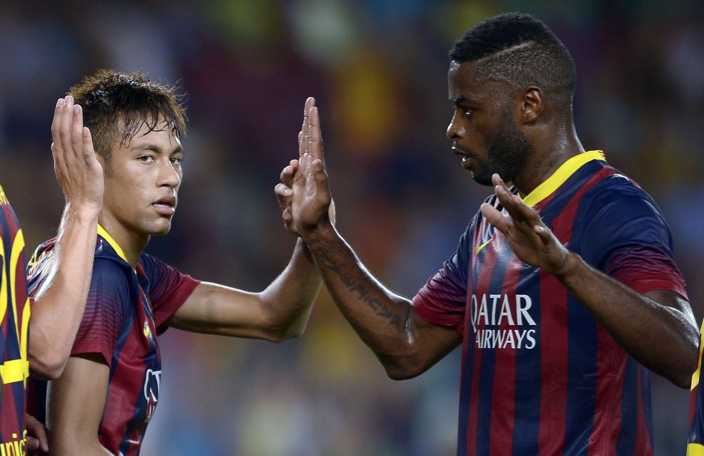 Neymar ja Alex Song (paremal) FC Barcelona särkides.