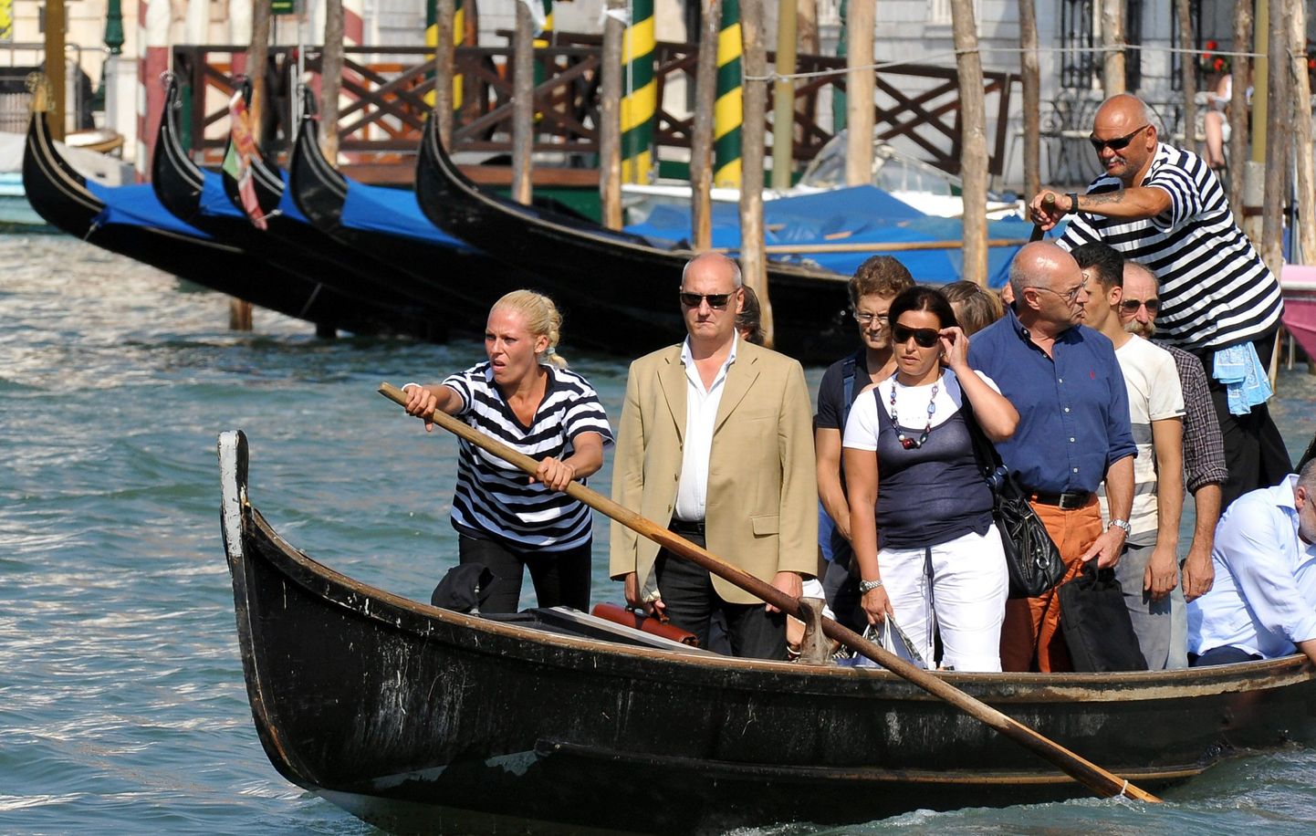 Giorgia Boscolo koos reisijate ja paarimehega
