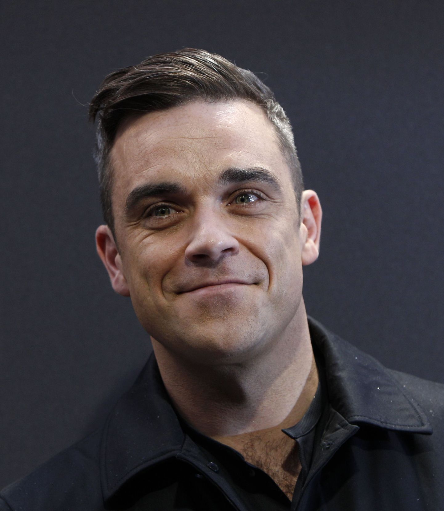 Robbie Williams saab esimest korda isaks.