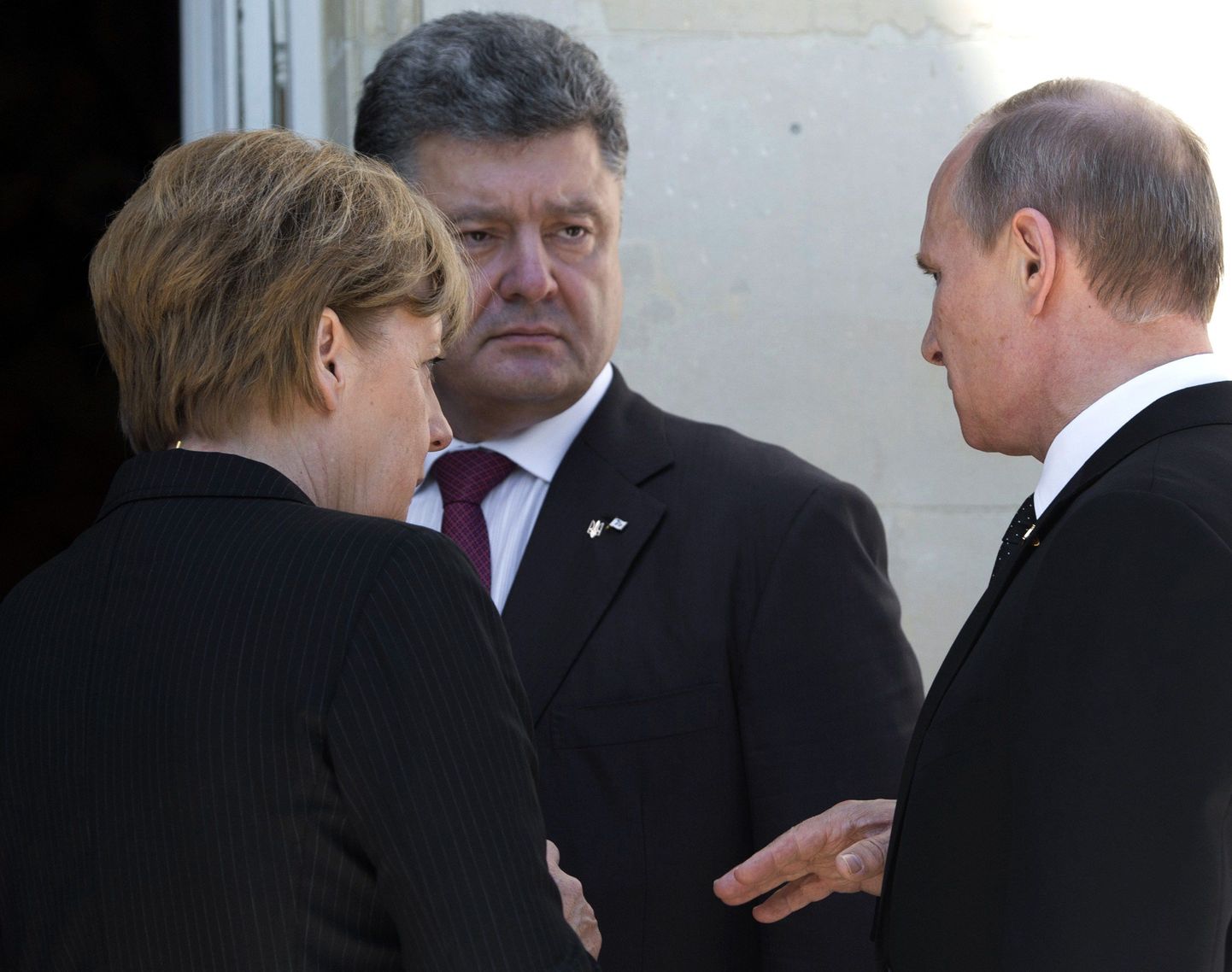 Ангела Меркель, Петр Порошенко и Владимир Путин.