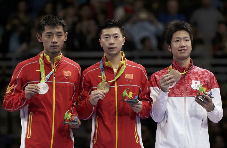 Ma Long (keskel), Zhang Jike (vasakul), Jun Mizutani (paremal). Foto: REUTERS