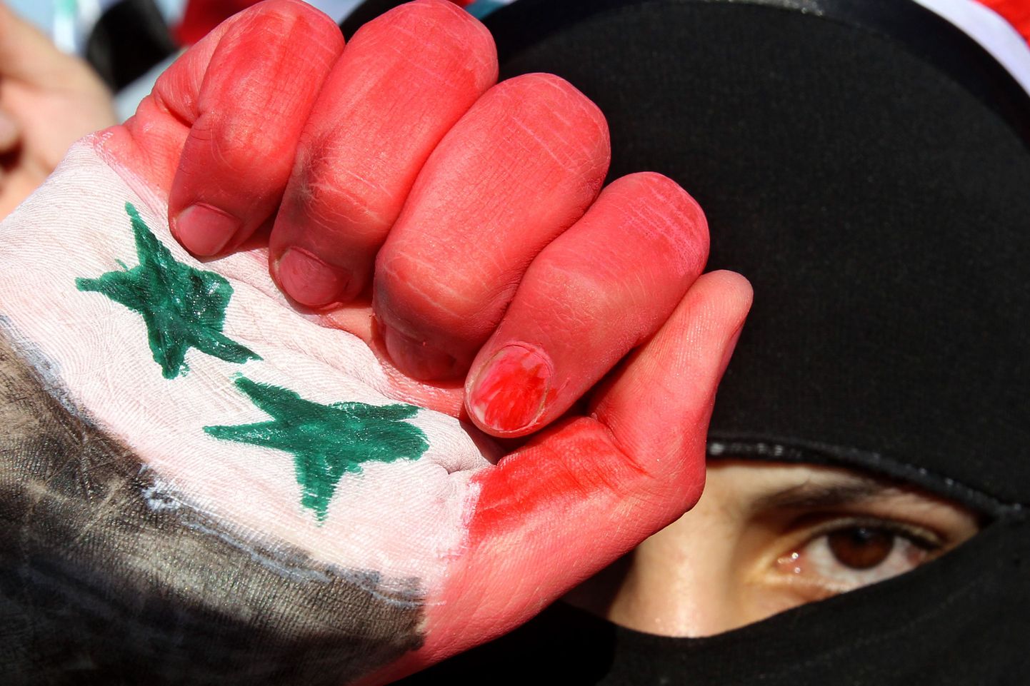 Jordaanias elav süüria naine avaldamas meelt Süüria presidendi Bashar al-Assadi vastu.