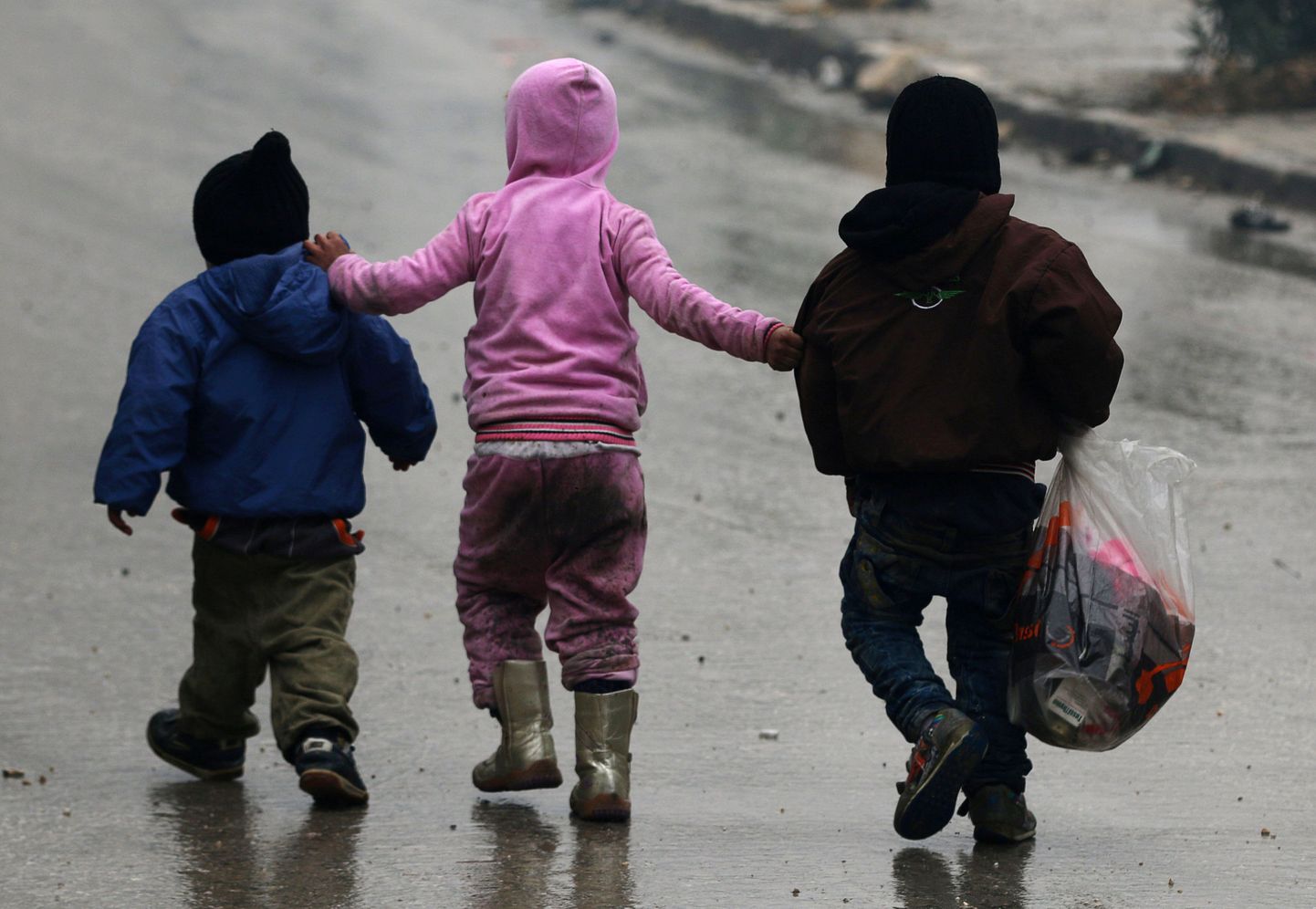 Lapsed Süürias Aleppo tänaval sel nädalal.