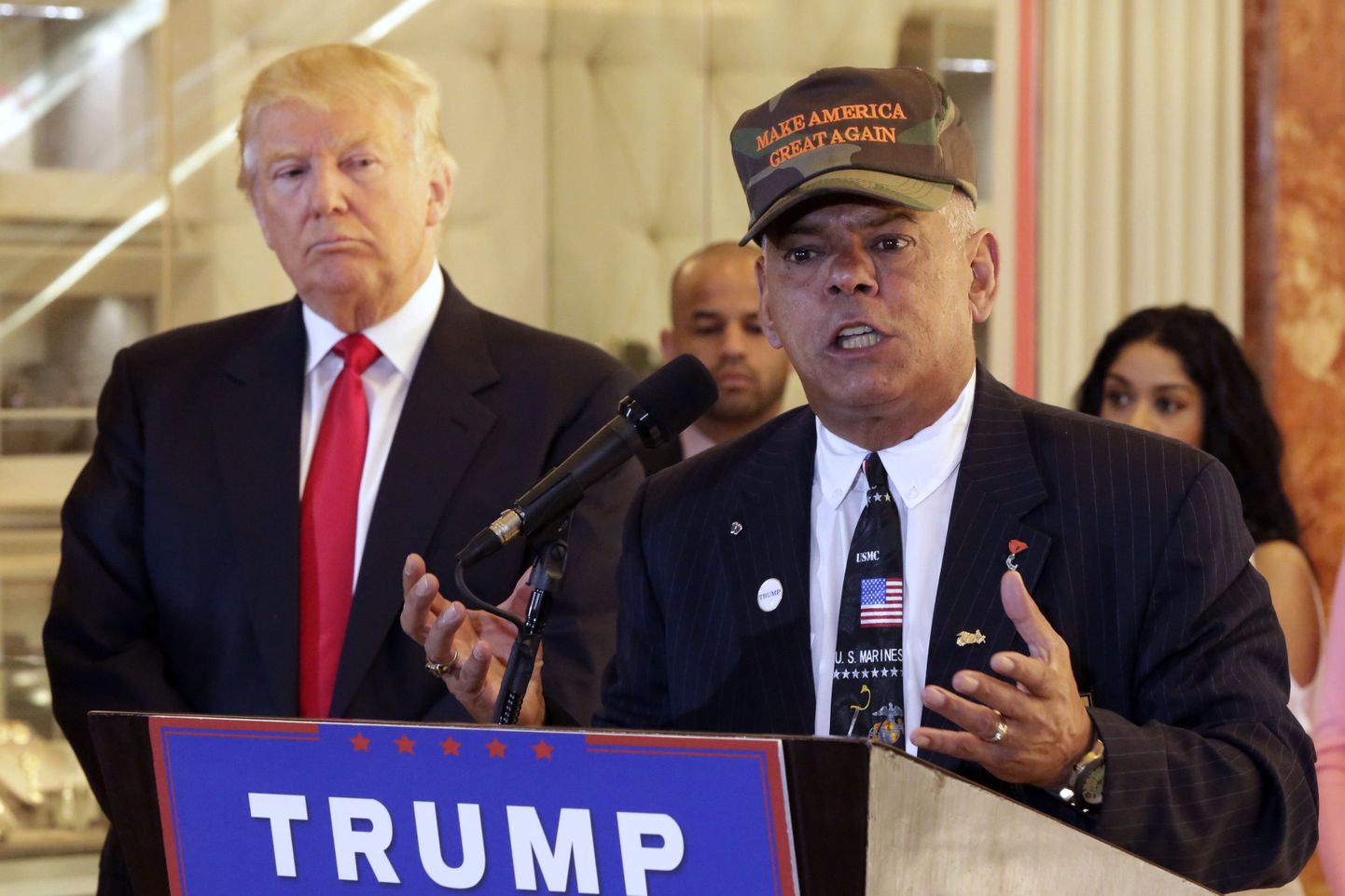 FILE - In this May 31, 2016, file photo, Republican presidential candidate Donald Trump listens at left as Al Baldasaro, a New Hampshire state representative, speaks during a news conference in New York. Baldasaro said on a Boston radio program on July 19 that Hillary Clinton should be