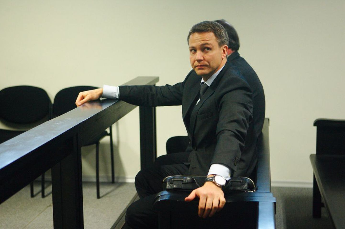 Liviko juht Janek Kalvi kohtusaalis kui alkoholitootjat süüdistati kartellikokkuleppes.