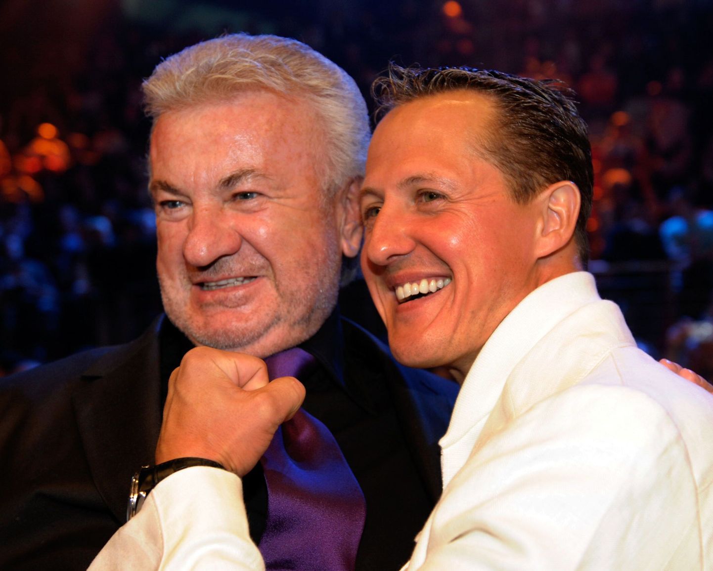 Michael Schumacher (paremal) ja Willi Weber