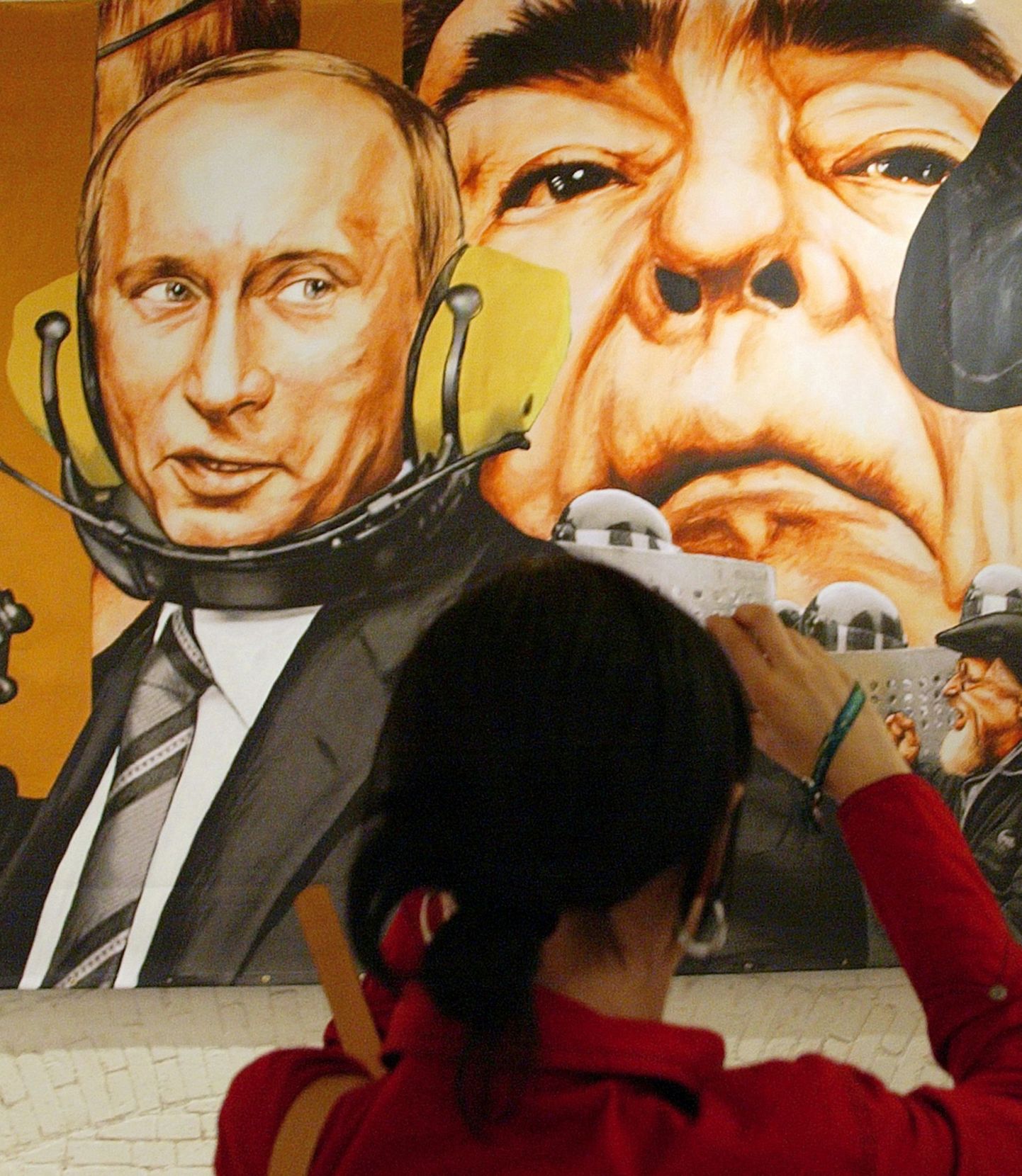 Venemaa president Vladimir Putini ja NLKP peasekretäri Leonid Brežnev kollaž Moskva kunstikeskuses.