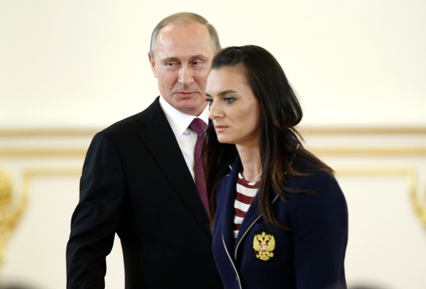 Владимир Путин и Елена Исинбаева на встрече президента РФ с олимпийской сборной.