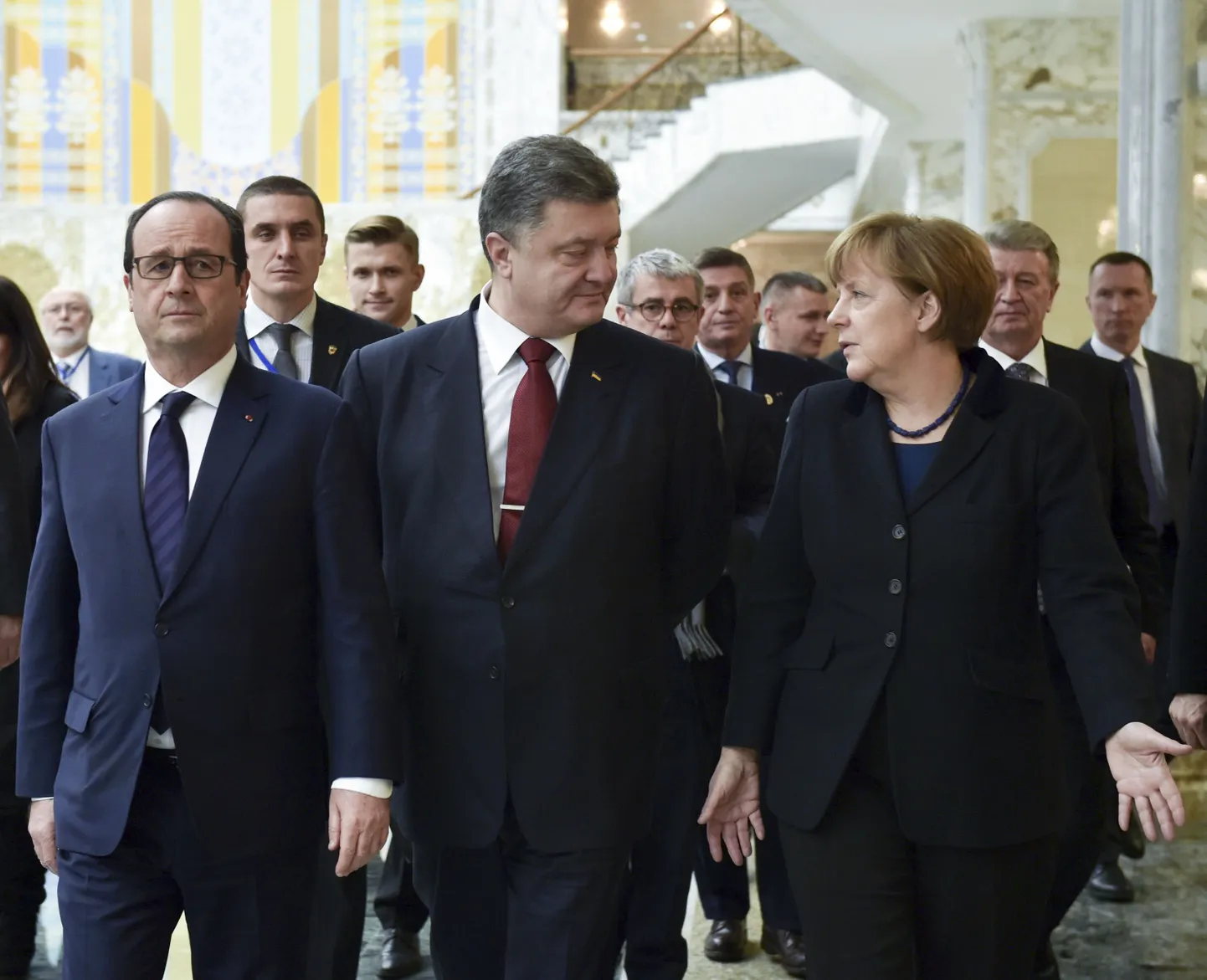 Франсуа Олланд, Петр Порошенко и Ангела Меркель в Минске.