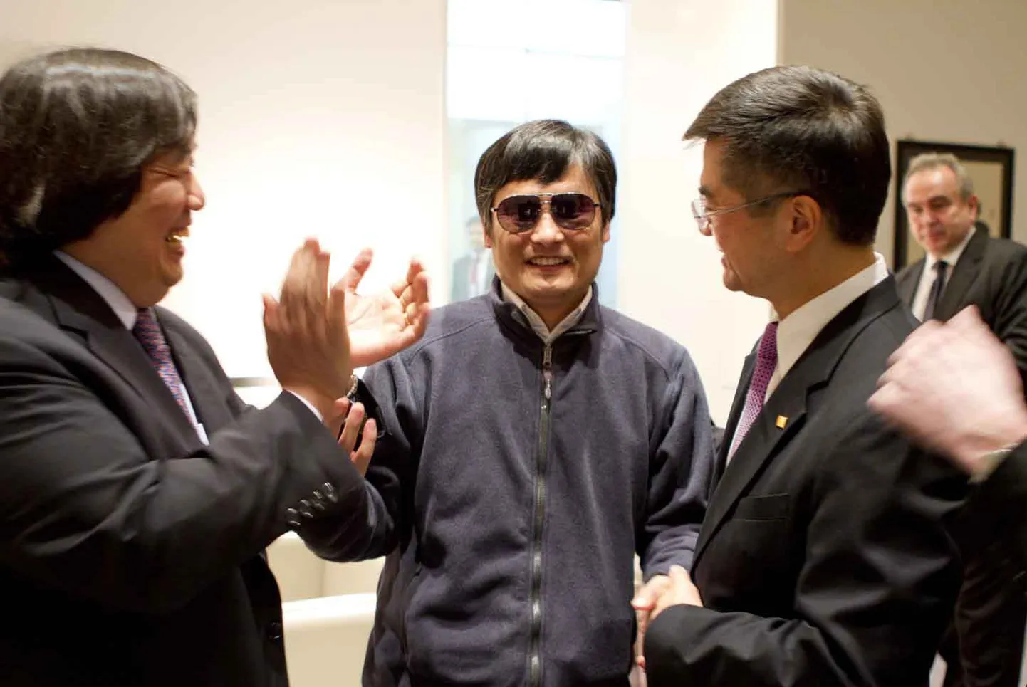 Chen Guangcheng (keskel)