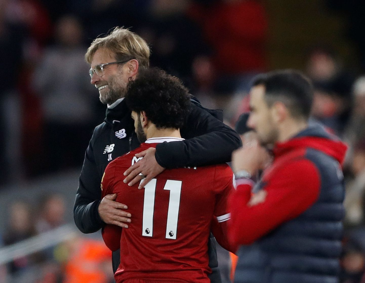 Jürgen Klopp kallistamas Mohamed Salah'd