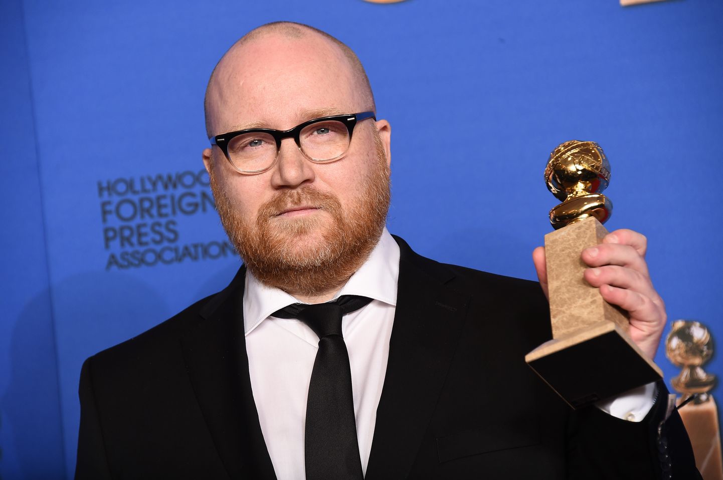 Johann Johannsson poses in the press room with the award for best original score for ?The Theory of Everything? at the 72nd annual Golden Globe Awards at the Beverly Hilton Hotel on Sunday, Jan. 11, 2015, in Beverly Hills, Calif. (Photo by Jordan Strauss/Invision/AP)