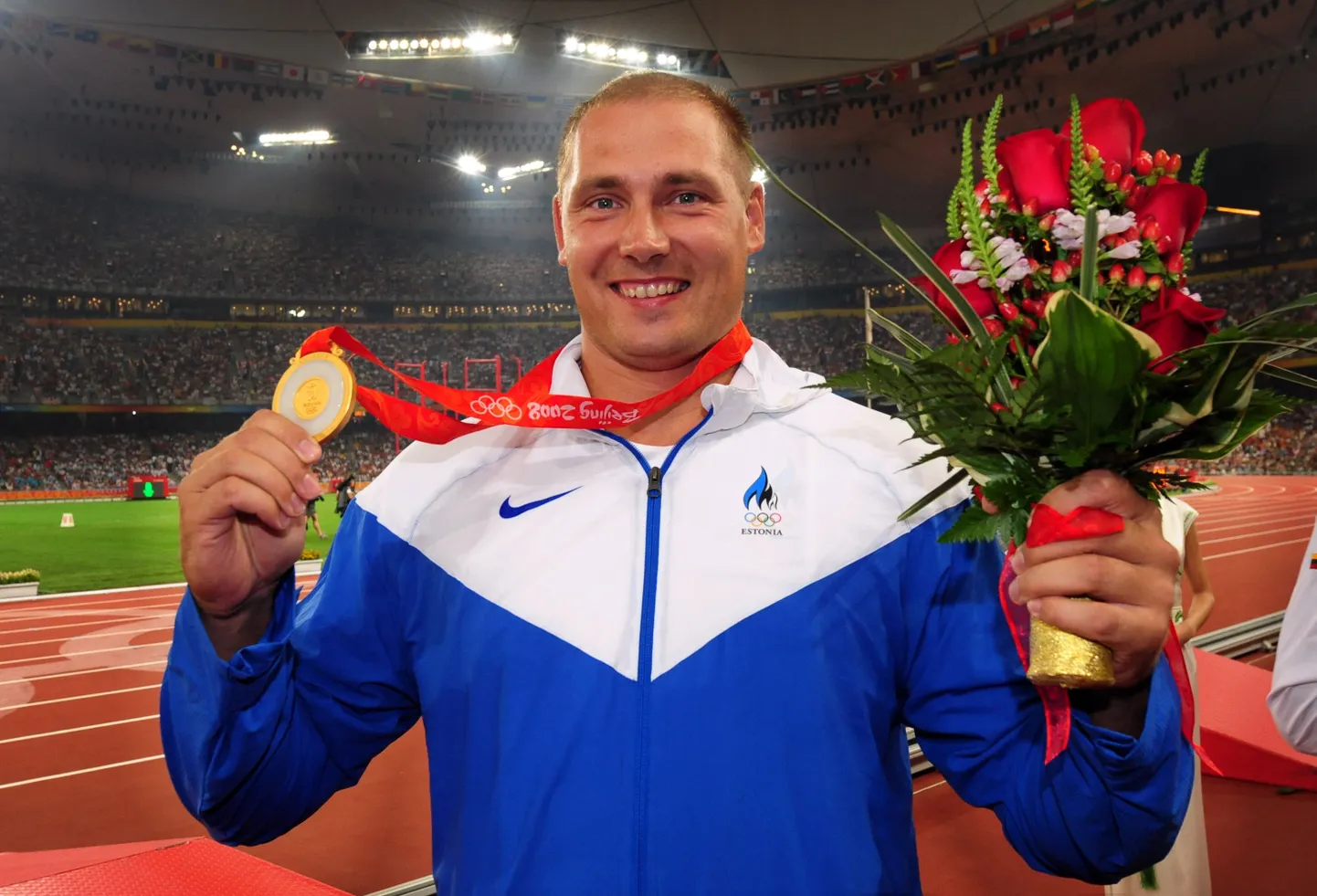Gerd Kanter Pekingi OMi kuldmedaliga.