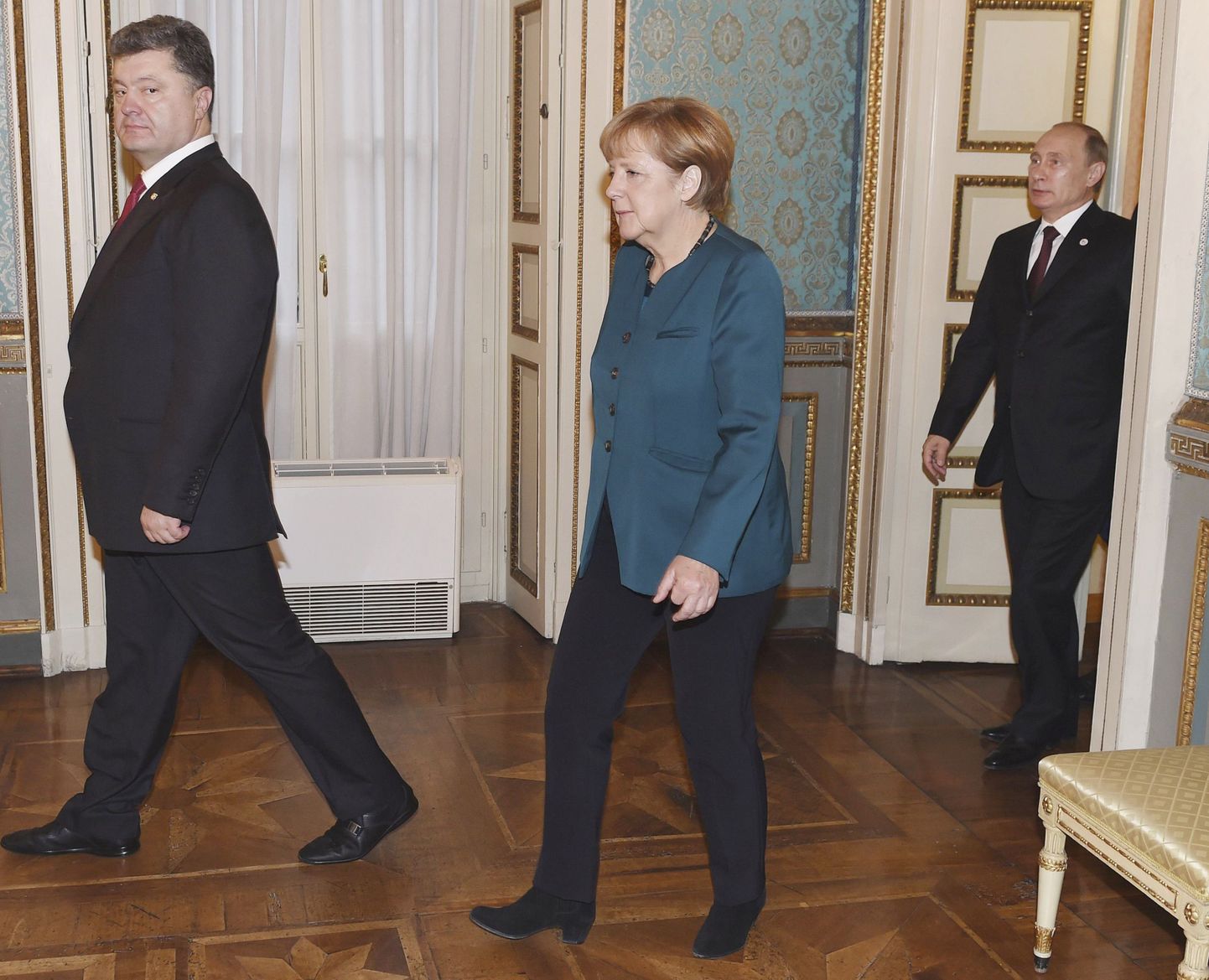 Petro Porošenko (vasakul),Angela Merkel ja Vladimir Putin