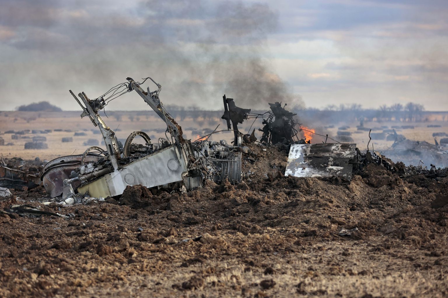 The wreckage of a warplane burns after it crashed near Yenakijeve, Russian-controlled Donetsk region, eastern Ukraine.