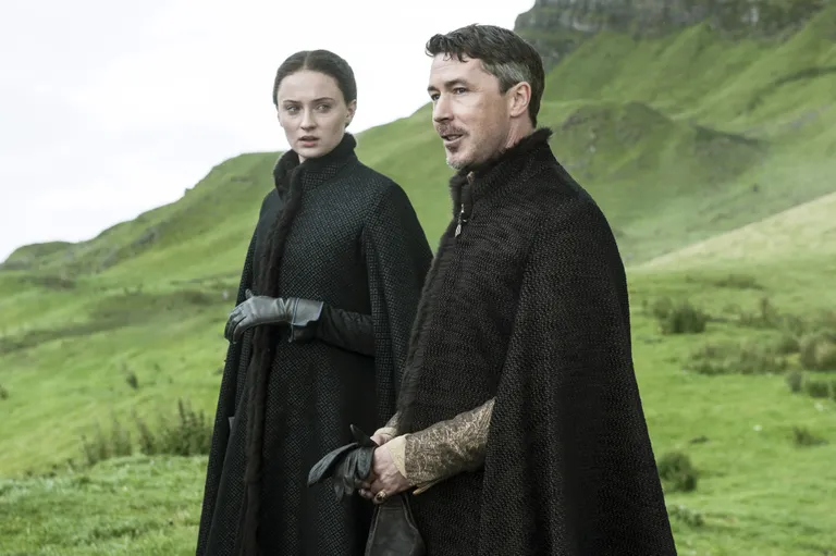 In this image released by HBO, Sophie Turner, as Sansa Stark, left, and Aidan Gillen, as Petyr "Littlefinger" Baelish, appear in a scene from the HBO original series, "Game of Thrones," premiering Sunday, April 12, 2015, on HBO. For the first time, "Game of Thrones" and AMC's "Mad Men," which premieres April 5, will be available to so-called cord cutters _ legally. (AP Photo/HBO)