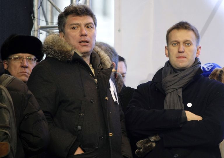 Министр финансов РФ Алексей Кудрин, а также лидеры оппозиции Борис Немцов и Алексей Навальный на протестном шествии по проспекту Сахарова в Москве, декабрь 2011.