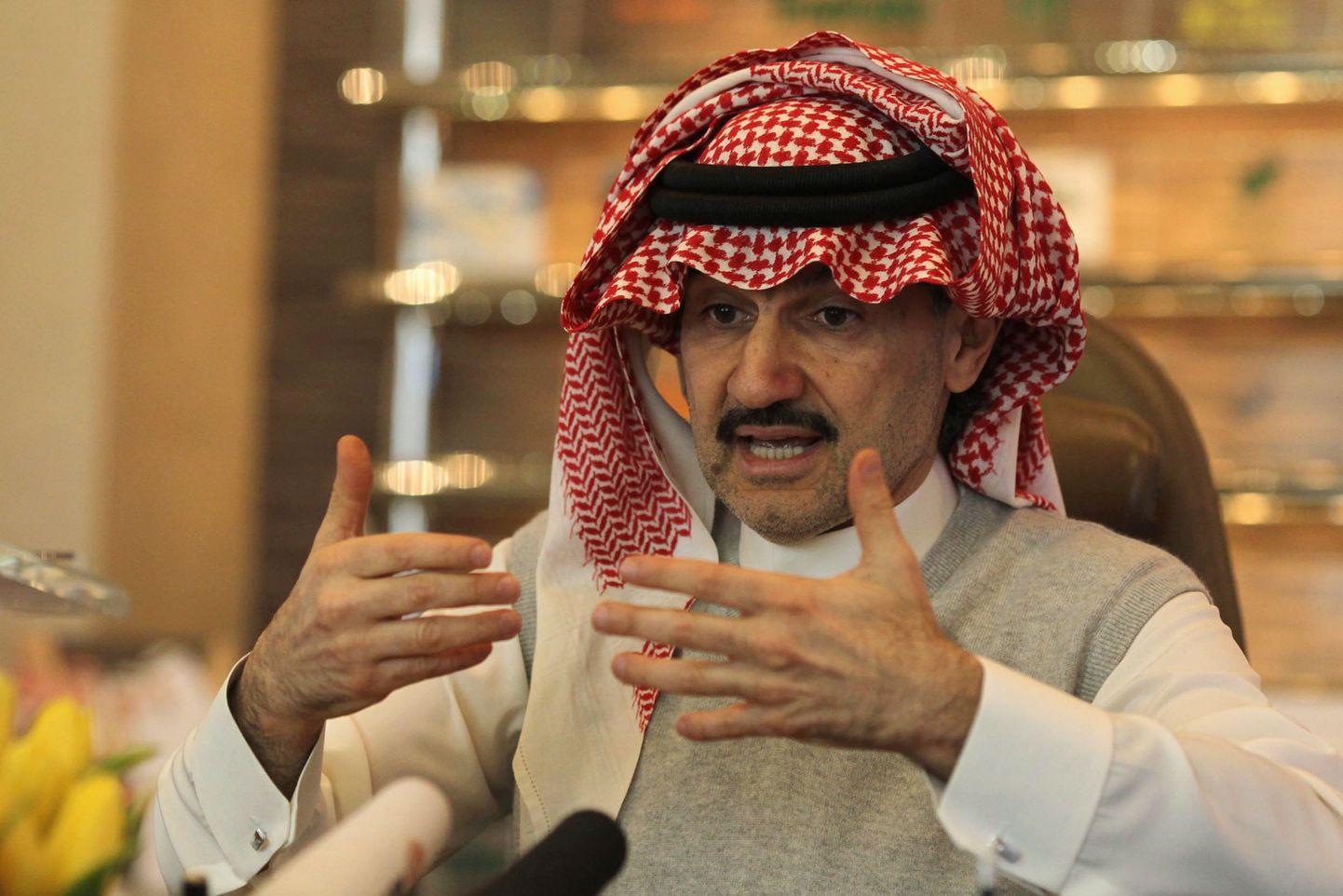 Saudi Prince Alwaleed bin Talal speaks during an interview with Reuters at his offices in Kingdom Tower in Riyadh, May 6, 2013. A potential split-up of the operations of U.S. bank Citigroup Inc is now "completely dead," Saudi prince Alwaleed bin Talal, the bank's largest individual shareholder said in an interview on Monday. REUTERS/Faisal Al Nasser (SAUDI ARABIA - Tags: BUSINESS)