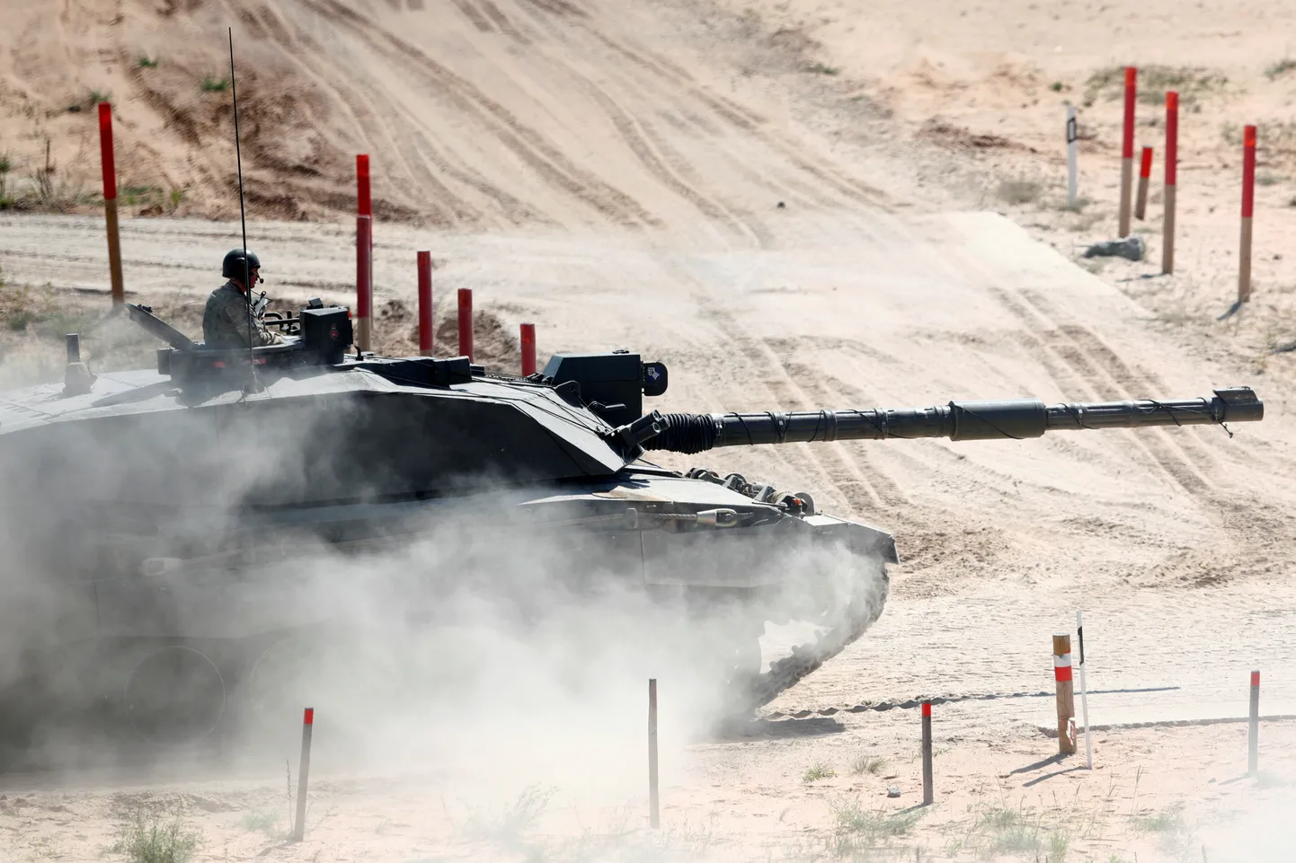 British Army Challenger tank of the NATO enhanced Forward Presence battle group based in Estonia, drives during certification field tactical exercise in Adazi, Latvia June 18, 2020. REUTERS/Ints Kalnins