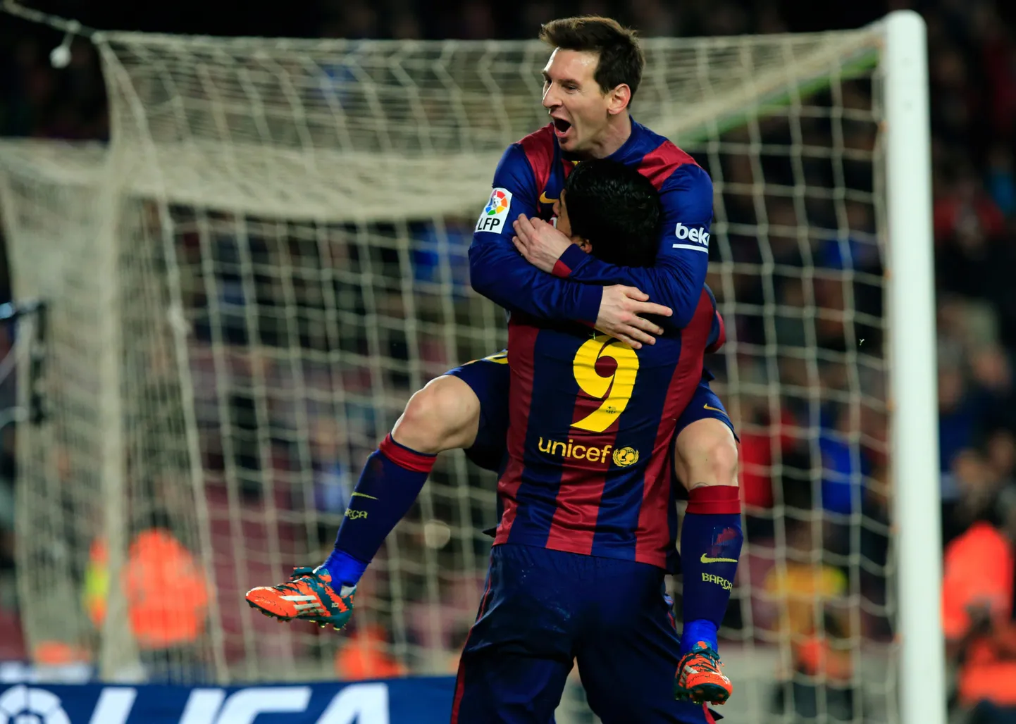 Lionel Messi (üleval) ja Luis Suarez