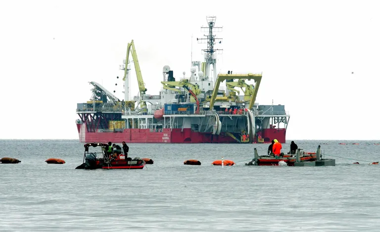 Some install, others cut. A Norwegian cable ship installing the Estlink 2 electricity cable in Estonian coastal waters.