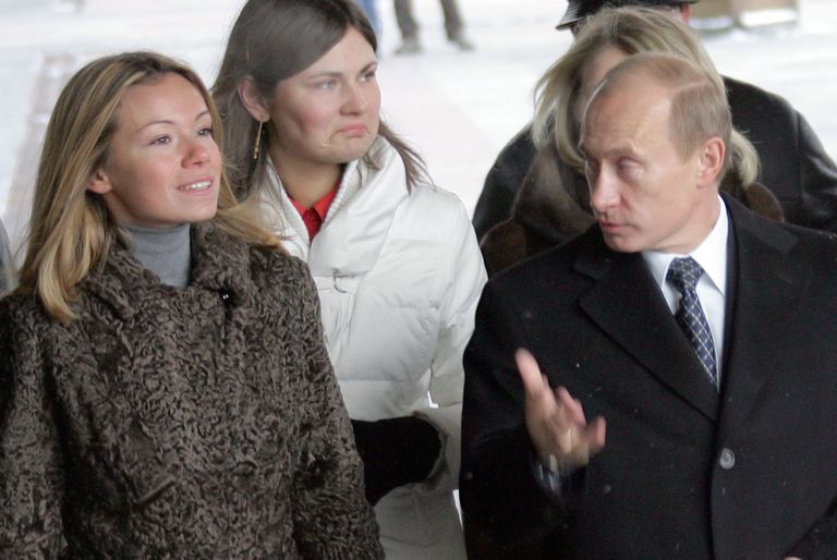 Maria Putina (vasakul) ja president Vladimir Putin (paremal)