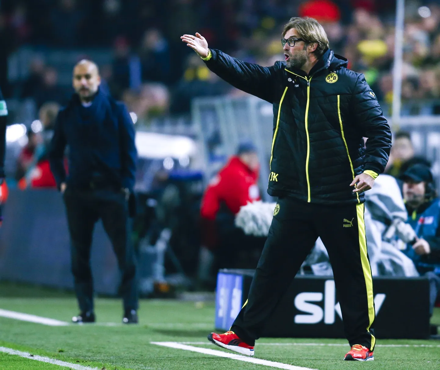 Jürgen Klopp (esiplaanil), Pep Guardiola tagaplaanil.