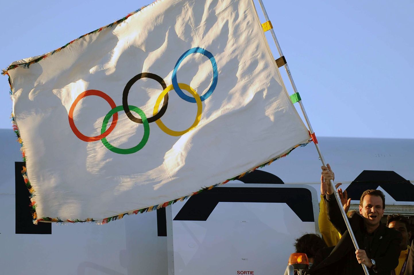 Олимпийский флаг.