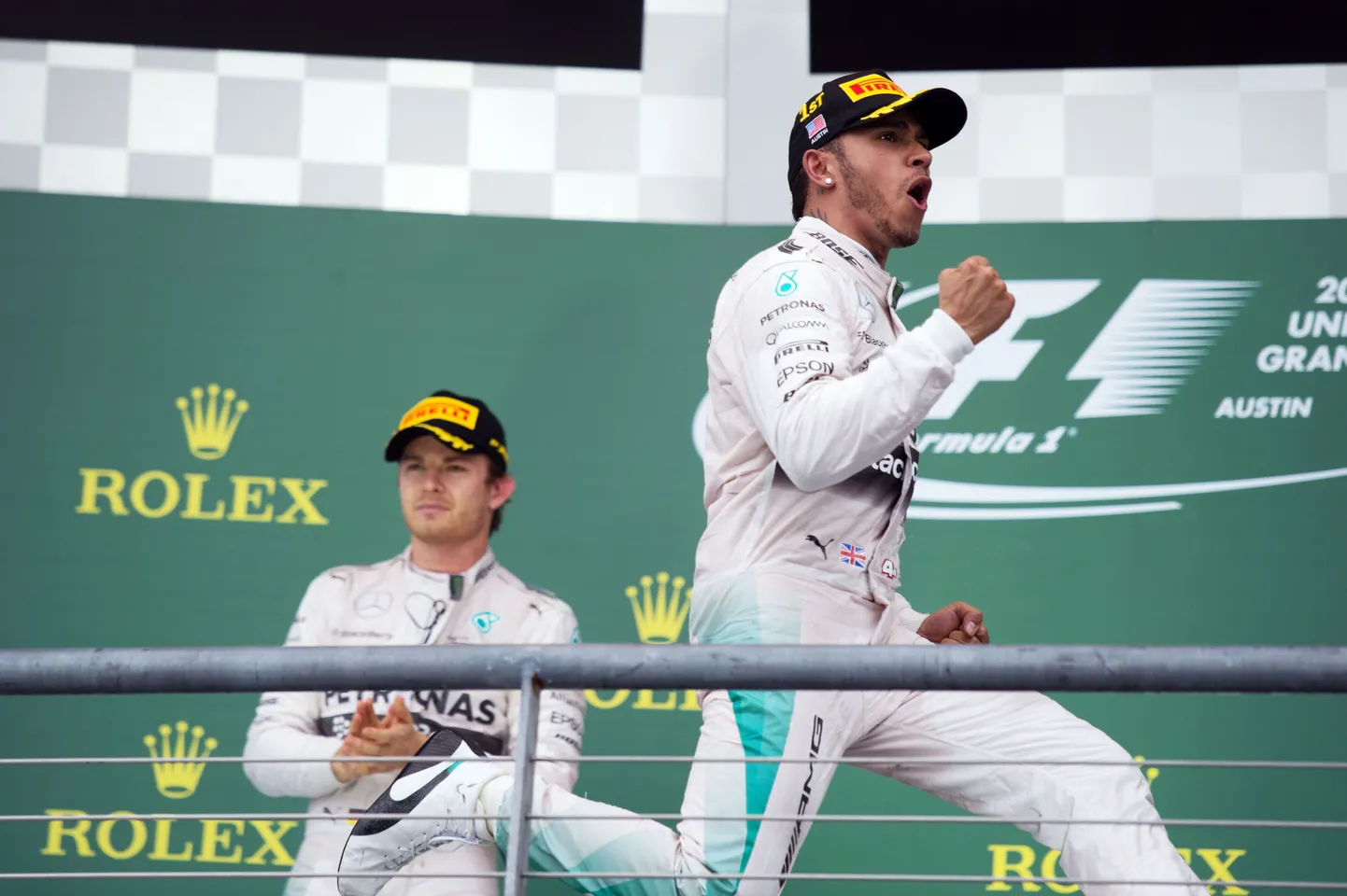Lewis Hamilton ja Nico Rosberg USA etapi poodiumil.