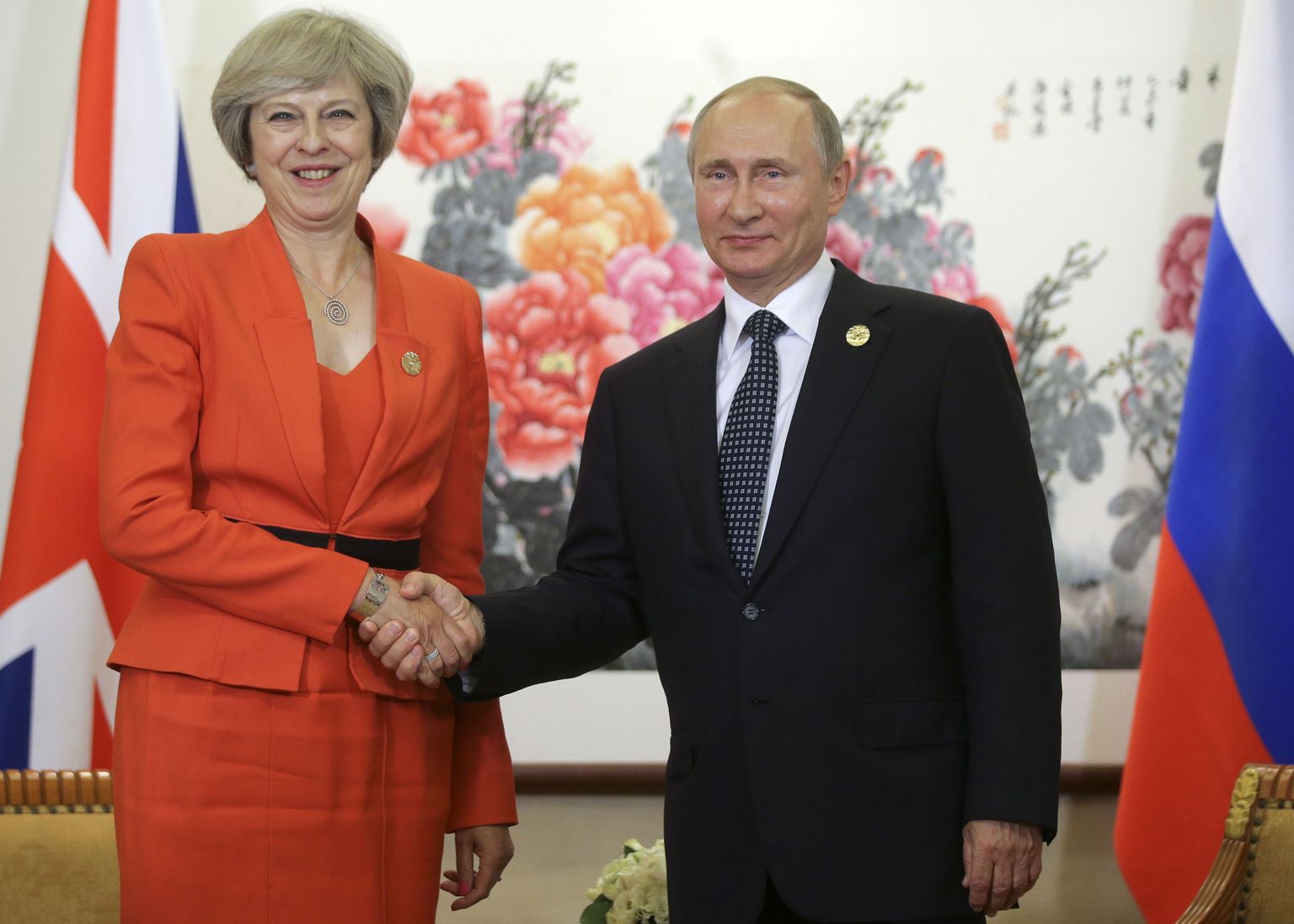 Venemaa president Vladimir Putin ja Briti peaminister Theresa May esimesel kohtumisel Hiinas.