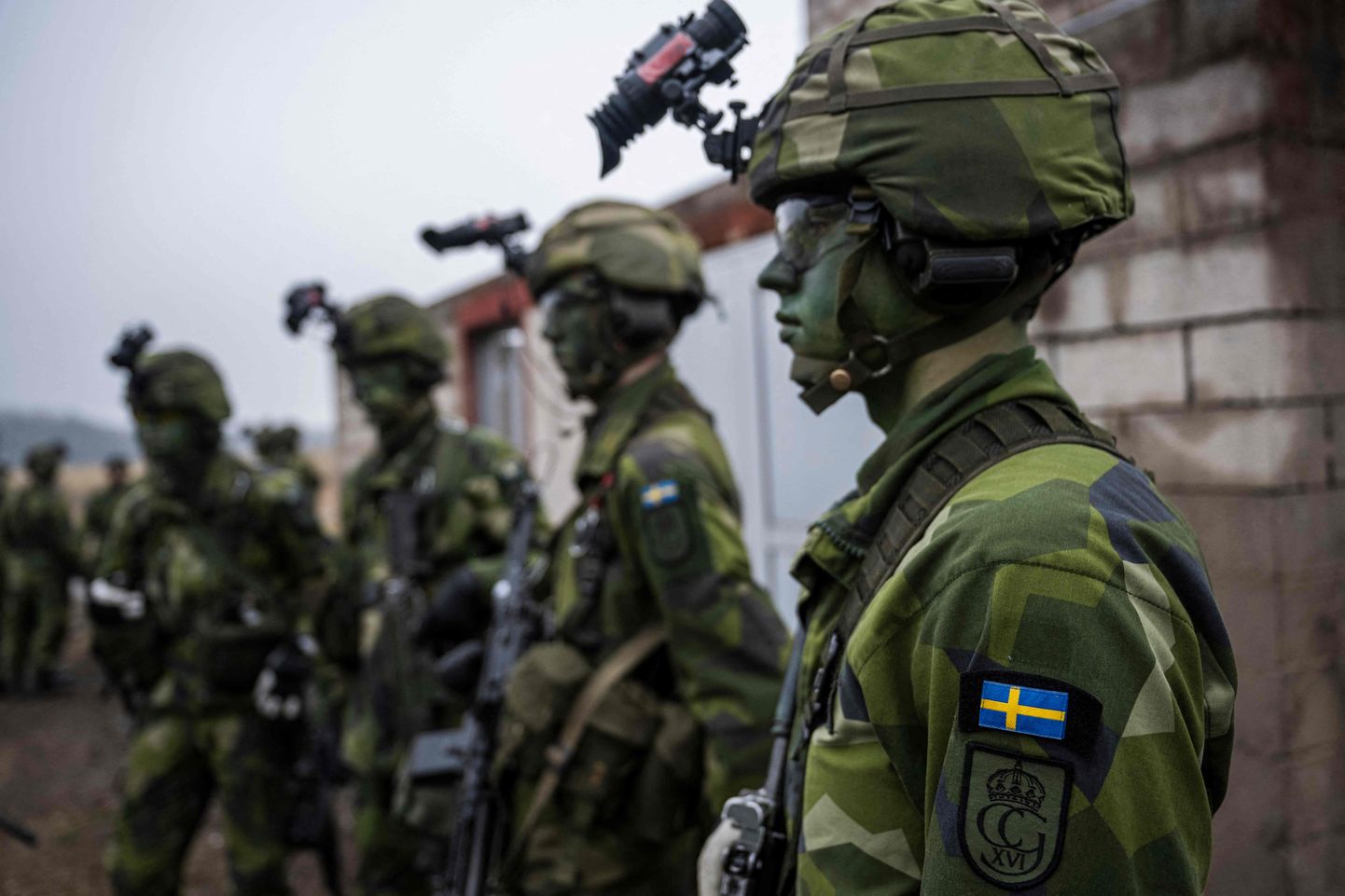 Soldiers from the 13th counter intelligence battalion, 2nd reconnaissance platoon of the Swedish Armed Forces, participate in military exercise in Kungsangen, near Stockholm on February 27, 2024.
