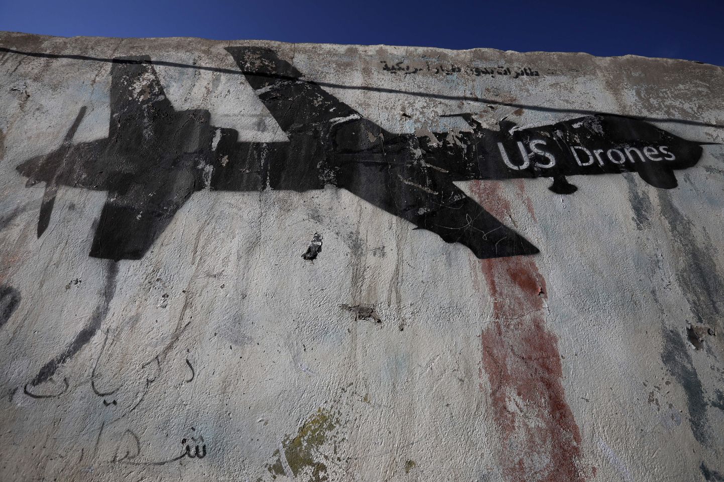 USA lahingdrooni kujutav graffiti.