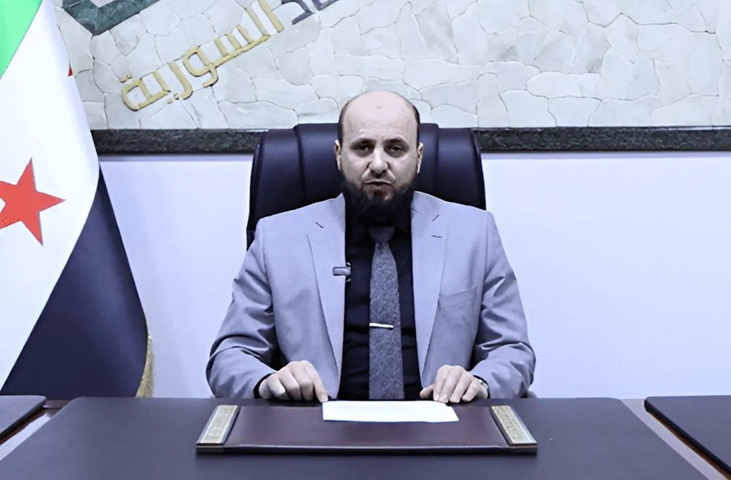 Süüria üleminekuvalitsuse juht al-Bashiri.