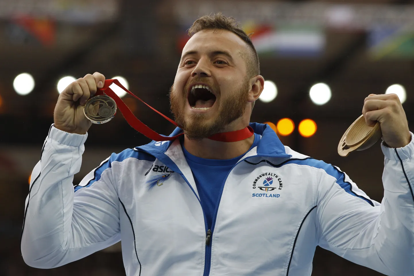 Mark Dry 2014. aasta Briti Rahvaste Ühenduse mängude pronksmedaliga.