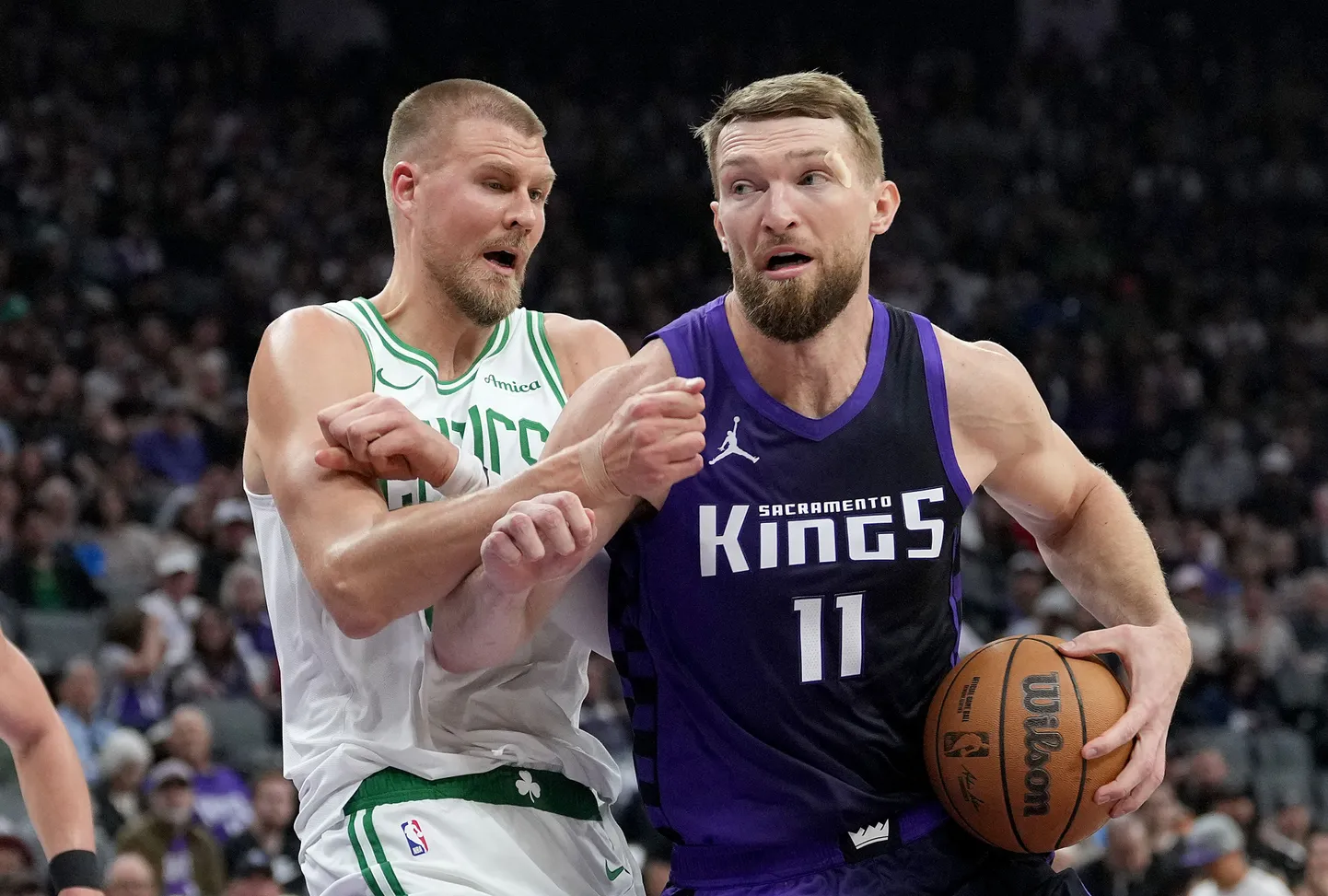 NBA spēlētāji Kristaps Porziņģis un Domants Sabonis