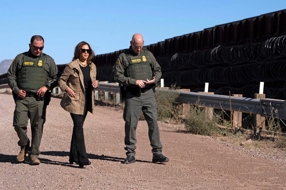 US Vice President and Democratic presidential candidate Kamala Harris (C) visits the US-Mexico border with US Border Patrol in Douglas, Arizona, on September 27, 2024.