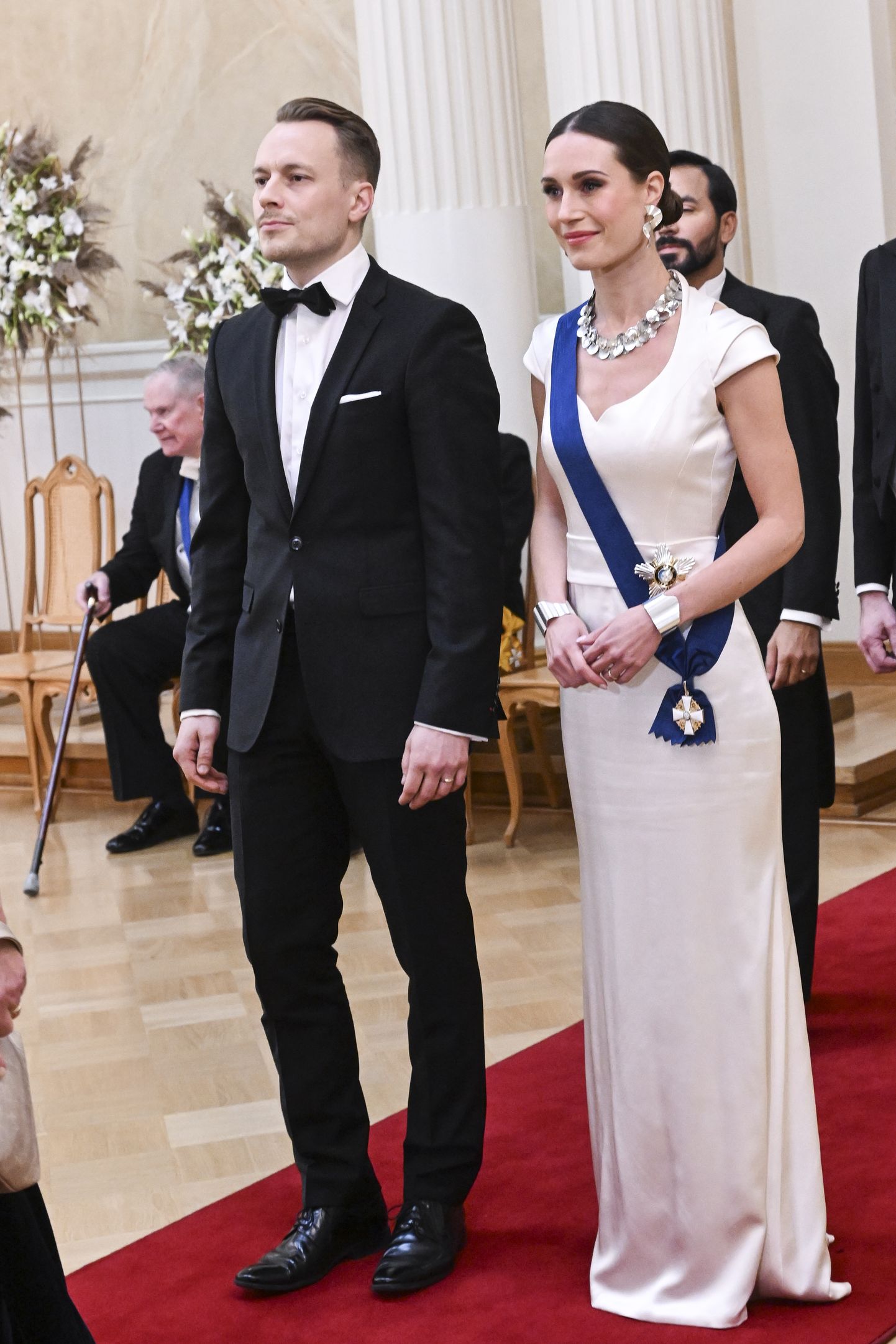 Soome peaminister Sanna Marin ja ta abikaasa Markus Räikkönen 6. detsembril 2022 Helsingis presidendipalees Soome Vabariigi aastapäeva vastuvõtul