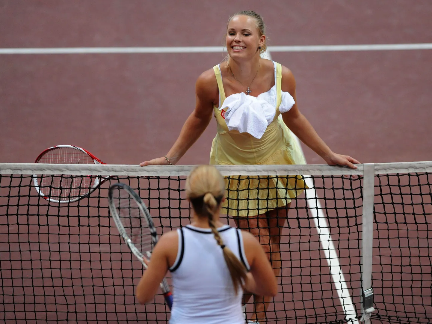 Caroline Wozniacki (üleval) ja Dominika Cibulkova