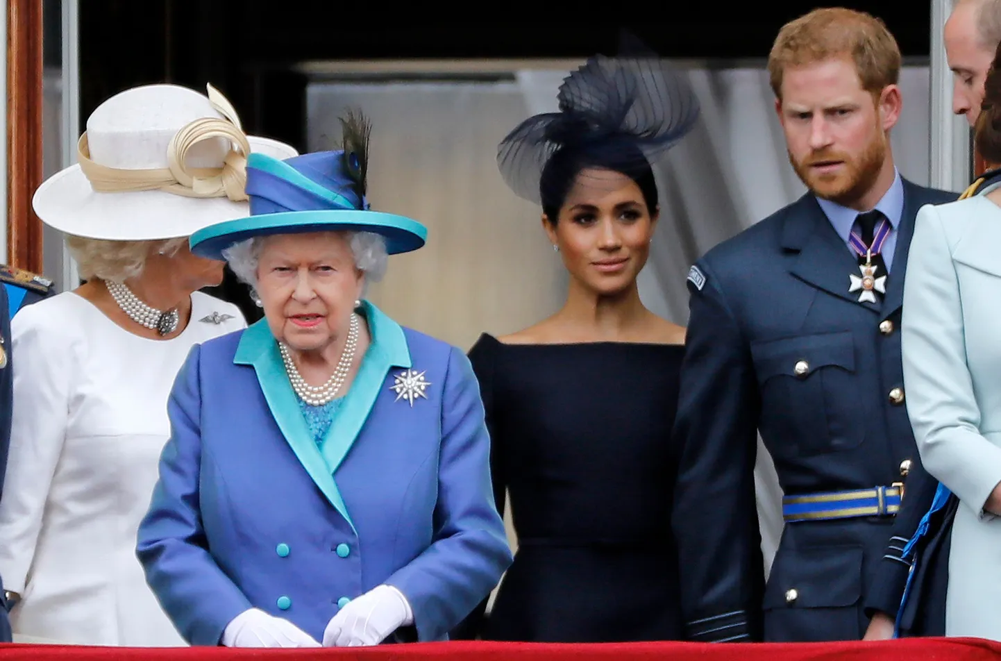 Kuninganna Elizabeth II, Sussexi hertsoginna Meghan Markle ja prints Harry.