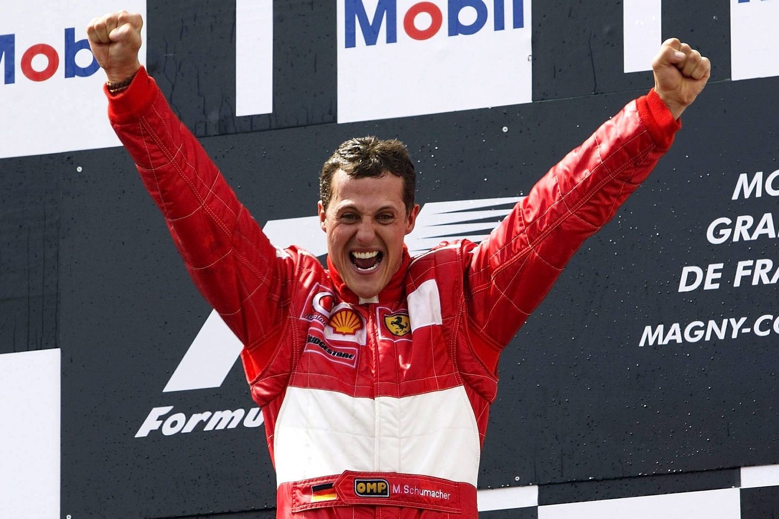 Michale Schumacher 2002. aasta Prantsusmaa GP poodiumil.