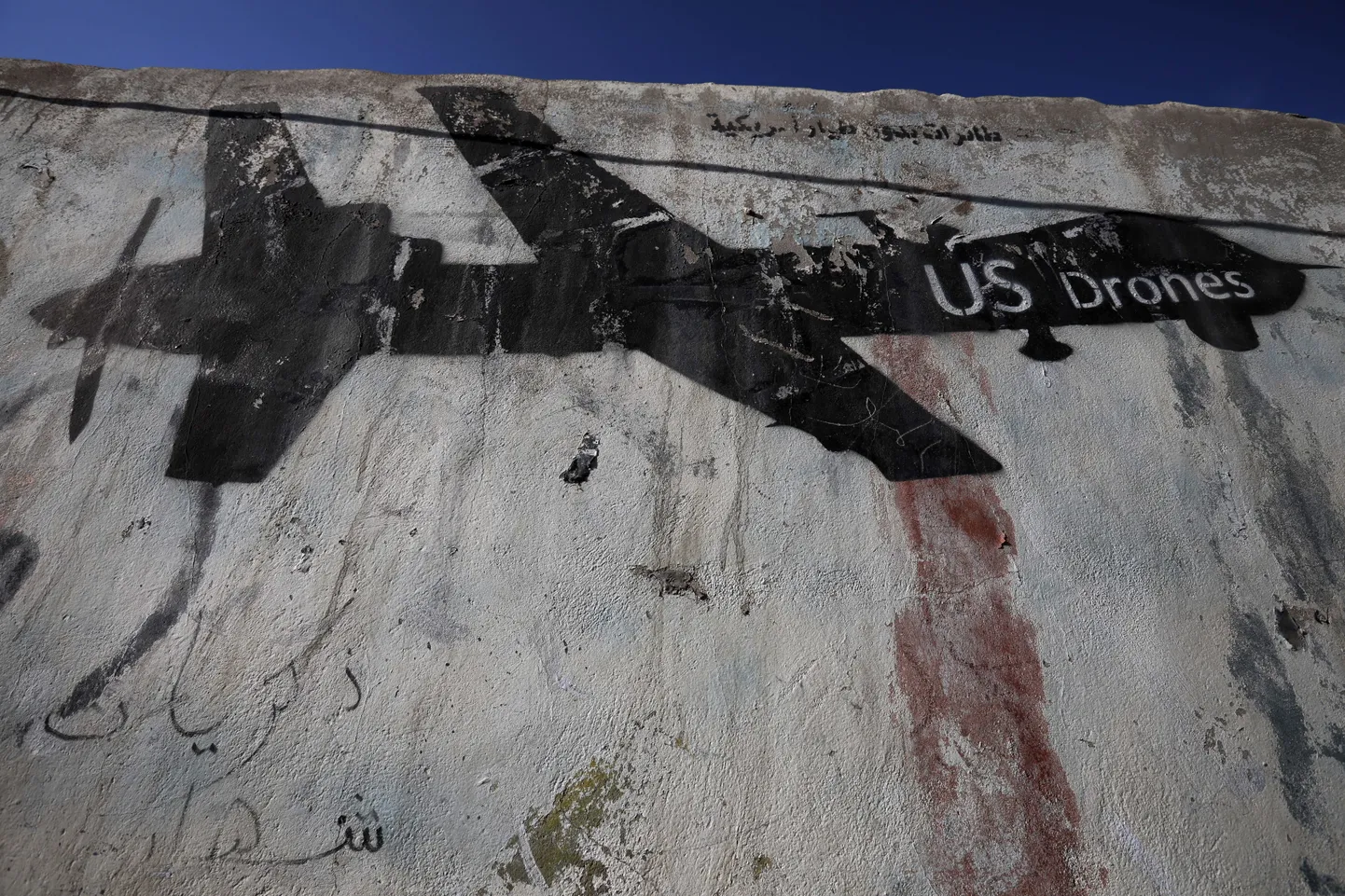 USA lahingdrooni kujutav graffiti.