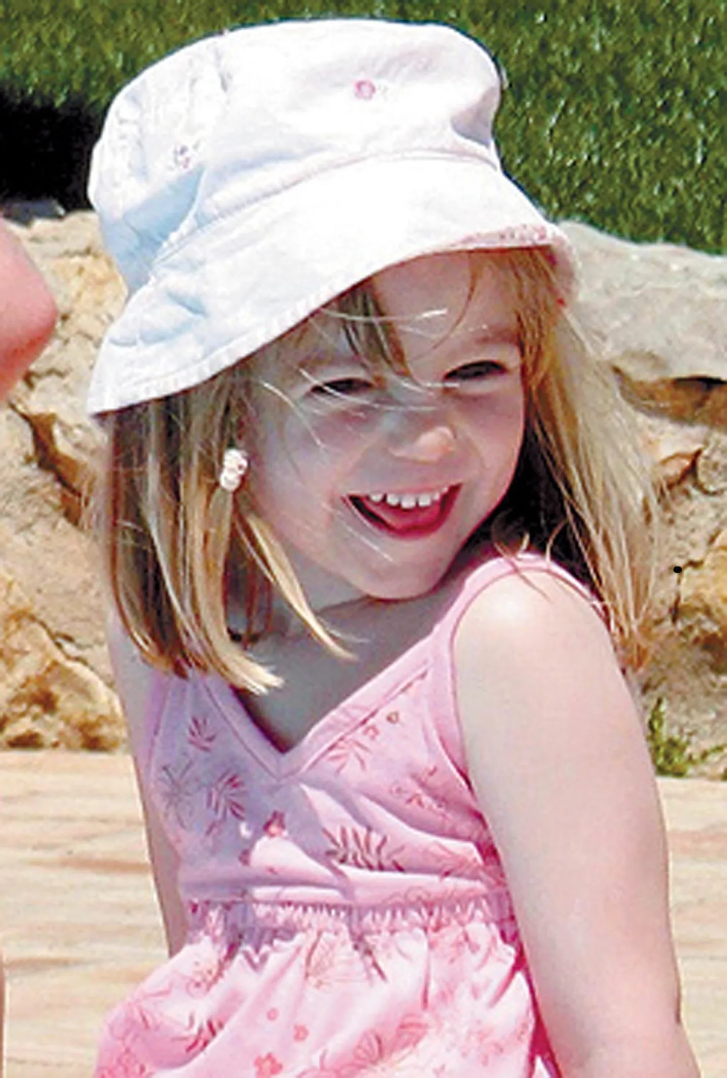 Madeleine McCann dateerimata fotol. Tüdruk kadus kolmeaastasena Portugalis Praia da Luzis perepuhkuse ajal 3. mail 2007.